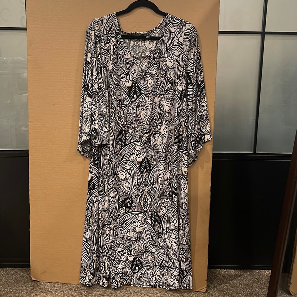 Crème and white long sleeve dress. Also the dress is long itself.